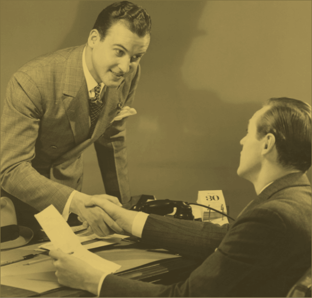 Two people shaking hands representing trusted partnerships and long-term client relationships at The Blondes